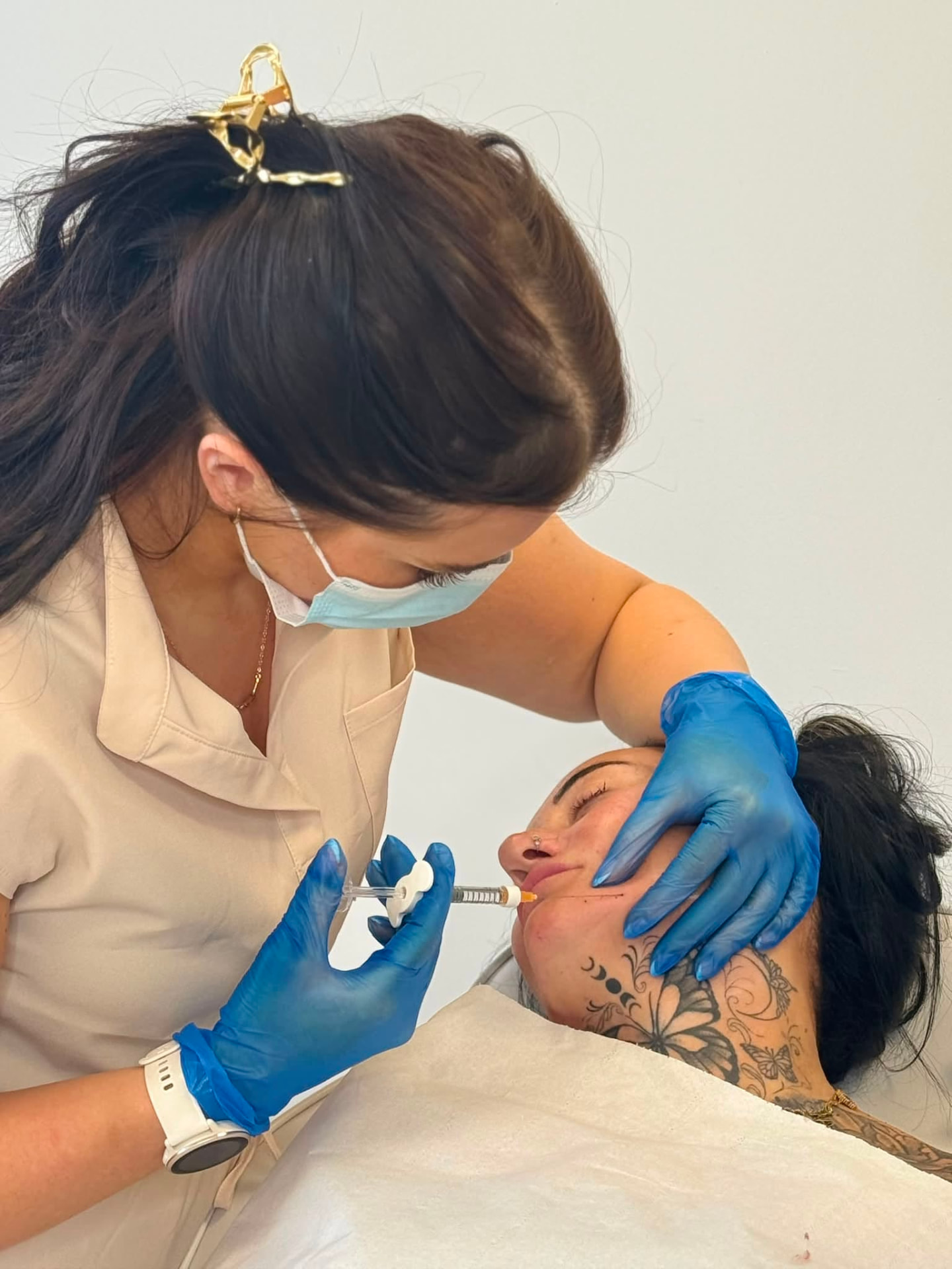 Laura carrying out a treatment at Simply Skin in Dumfries